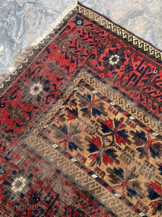 Antique camel hair Baluch rug. 3'0" x 5'2". All ends secured and much of the "wear" is from the oxidized browns. No holes.          