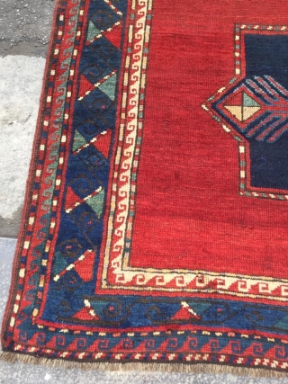 Antique Kazak rug. Beautiful open field with great greens and light blues. Good medium pile throughout. Dated. One old repair which is barely visible from the front.

Cheers.      