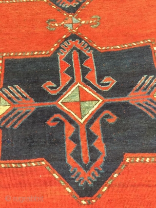 Antique Kazak rug. Beautiful open field with great greens and light blues. Good medium pile throughout. Dated. One old repair which is barely visible from the front.

Cheers.      