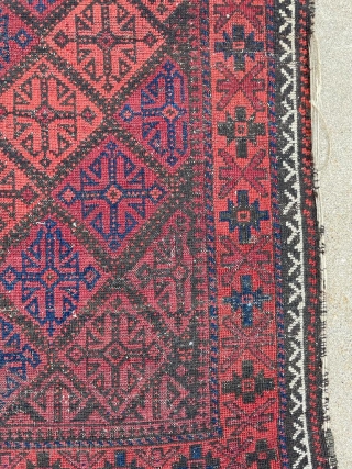 19th century Baluch rug. Original ends and sides. Field is in good condition with oxidation. 2'10" x 5'1" or 155 x 87cm.           