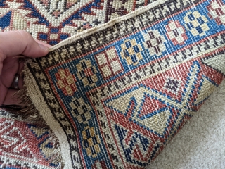 Late 19th century Shirvan prayer rug. 3'4" x 4'10". Has some old fuschine which is now grey. Beautiful colors. No holes, good pile, just the missing edges in some areas. Cheers.  