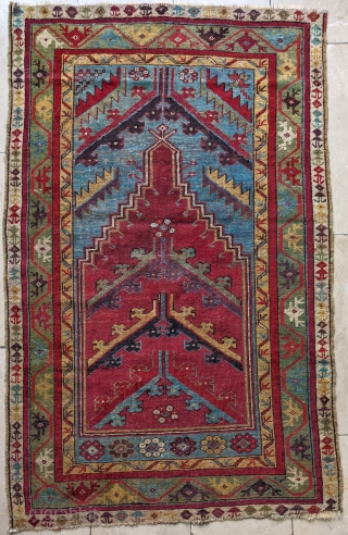 19th century Turkish Kirsehir, Mudjur prayer rug. Beautiful, natural colors. 3'5" x 5'5" or 103 x 163cm. Some repiling in the field, no large repairs.        