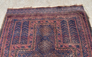 Antique Baluch prayer rug with original end finishes.                         