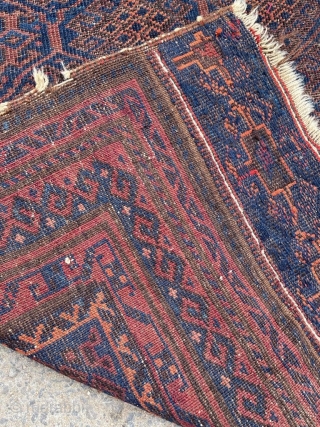 Antique Baluch prayer rug with original end finishes.                         