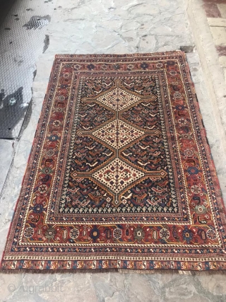 Beautiful antique Khamseh bird rug... so many birds! Great colors and very tight weave. Please, let me know if you need more information or photos. Included photos both of indoor and outdoor  ...