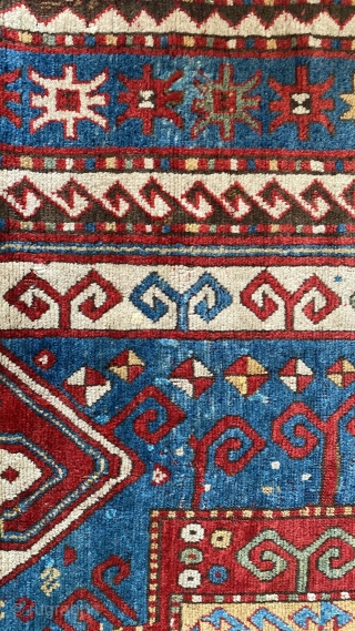 Antique Kazak Sewan in very good condition. Four corner professionally restored and some  scattered small old repairs. Size 255x180             