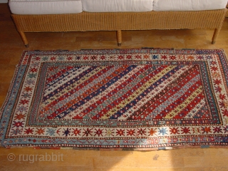 wonderful antique 1870 caucasison, superbe natural colors two reaired places, good pile, some minor coroaion, flat laying


94x173cm
3.1x5.8ft                