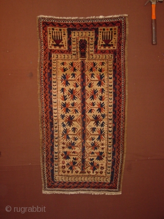 wonderful antique baluch prayer rug  , is has some small several repairs, due to old local mothbite, no stains, headends secured, flat lying
66x131cm
2.2x4.4ft         