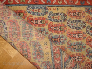wonderful wool quality, gendjeh ca 1900, great yellow ground, great natural colors, complete original headends, selvedges cut and secured, no stains, no repairs, in a small area some foundation visible, no holes,  ...