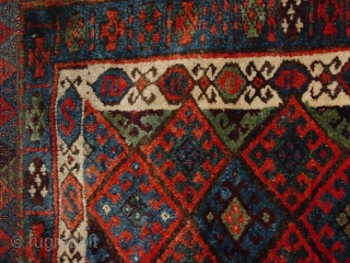 wonderful antique jaff kurdish bagface, very meaty  original pile, in superbe condition, no repairs, fabulous natural colors, and a great pattern!
jaff collectors must have... the blackfabric is loosely stitched, to make  ...