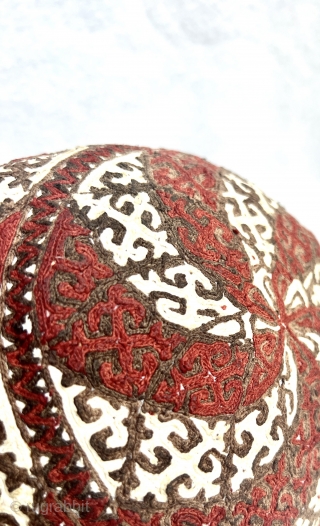 An exceptional and rare antique silk and cotton embroidered Turkmen Yomud  hat. There is a distinctive beauty to a good Turkoman embroidery that is unlike that of their neighboring group, the  ...