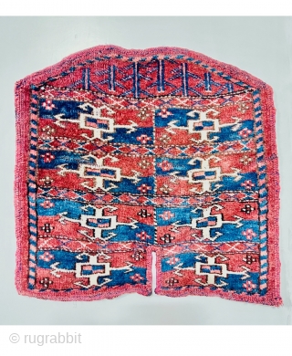 Second of the 19th.c Yumod Turkmen Saddle Cover,Nice strong natural colors and wonderful mid-blue Asymmetric textured open on left,42x43cm perfect condition            