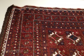 Elegant Baluch rug with Turkmen guls and kochaks from areas bordering Afghanistan;  fine weave;  five colors,  all natural;  handspan wool;  normal oxidation of the brown appropriate to  ...