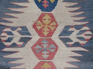 Wonderful Anatolian Kilim.it is an early piece,wool but best quality wool,very fine texture weaving,wonderfull naturel colours.great figures,graphic.the colours are really great and good combination.one end is missing and some holes.please feel free  ...