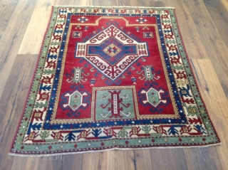 Unique Fahrola Kazak, with rare design and borders.the size 4x4'11 ( 122x150 cm)                    