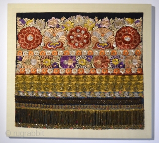 Hungarian Matyo silk hand-embroidered with gold metallic threads and beads, man's apron, part of a folk costume, early 1900s Mezokovesd, Northern Hungary. Cloth 25" x 23"
In plexi frame.     