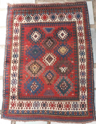 Caucasian Kazak Rug, as found, in very good condition, good pile and great colours (especially the purple), no repairs, mid 19th century.           