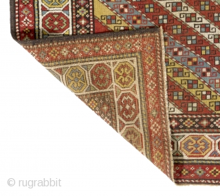 Colorful Caucasian Gendje Rug with diagonal stripes, 4 x 6.8 ft (119x203 cm), ca 1890                  
