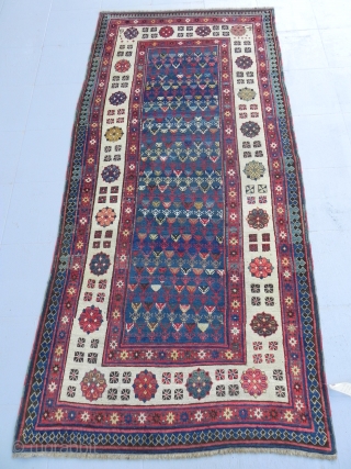 Antique Southeast Caucasian Talish long Rug with classic repeating rosette  and dice design border, 3.8 x 7.10 ft (116 x 244 cm), ca 1875, Full Pile, lustrous wool and saturated colors,  ...