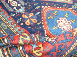 Shirvan Baku Rug, 5.2 x 3.10 (157x121 cm), dazzling colours and dynamic design, very good condition, original ends and sides, even medium pile. late 19th century. www.rugspecialist.com      