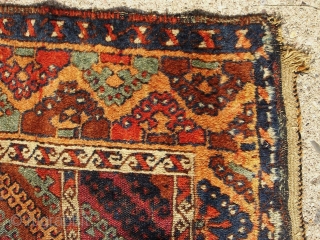 Anatolian Kurdish Yoruk rug. 50X79 Inches... 127X201 Cm. All intact with braided ends. Mostly good pile, some wear, dirty with washable stain and a crease cut as shown.     