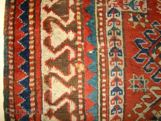 Small Caucasian Kazak Prayer rug. 35"X50"....90X128 Cm. A few small holes and crease wear as shown. Better pile in the border area. All original sides and ends.      