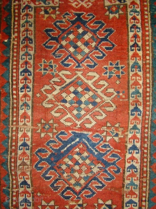 Small Caucasian Kazak Prayer rug. 35"X50"....90X128 Cm. A few small holes and crease wear as shown. Better pile in the border area. All original sides and ends.      