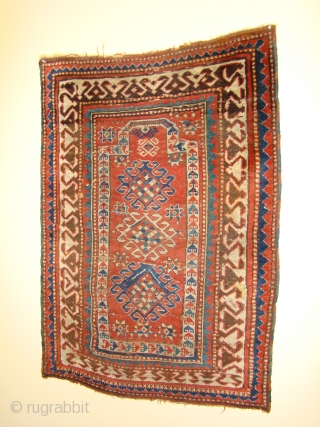 Small Caucasian Kazak Prayer rug. 35"X50"....90X128 Cm. A few small holes and crease wear as shown. Better pile in the border area. All original sides and ends.      