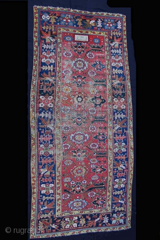 NW Persian Long rug dated 1261, (1845). Wool foundation with blanket like handle. Generally good short pile with scattered old repairs and wear. Size: 4X9 feet, 122X275 Cm. Detail photos available.   ...