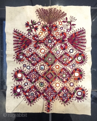 A beautiful silk, mirror and metal work embroidery from Afghanistan dating to early 1900s. Unlike the textiles of other groups of Central Asia (such as Uzbeks or Turkomans) the designs and ornaments  ...