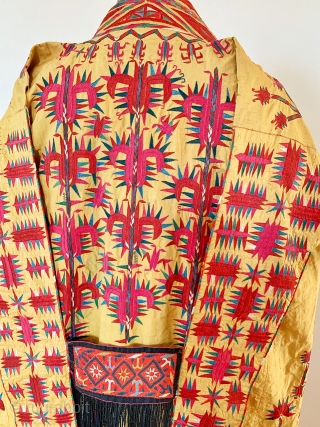 An outstanding antique Tekke Turkoman / Turkmen silk embroidered on silk yellow Chyrpy ( Cherpi / Chirpi / Chyrpi ), dating to mid 19th Century or even older. The Chyrpy was the  ...