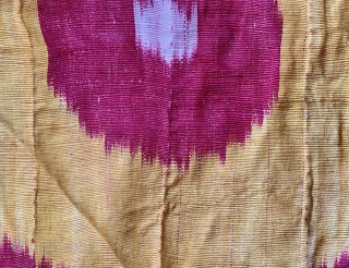 A beautiful Antique Uzbek Ikat Robe from Bokhara / Bukhara. It is an adras Ikat (silk warp/cotton weft) from third quarter of the19th Century. The archaic design with bold sun burst motifs  ...