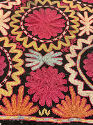 Flowers and fireworks. An antique Uzbek Lakai tribe silk embroidered talismanic ilgich hanging dating to the 19th century. These bridal embroideries were made as dowry offerings and hung on yurts / tents  ...