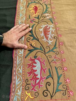 An excellent Antique Uzbek silk suzani dating circa last quarter of the 19th Century. Though such types are often generically called lakai, It is likely made in rural areas around the city  ...