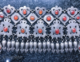 A rare  silver with carnelian inset antique Turkoman / Turkmen Jewellery attributed to the Yomud / Yomud confederation tribes. Dating to the 19th century, this rare head band (attached on hats)  ...