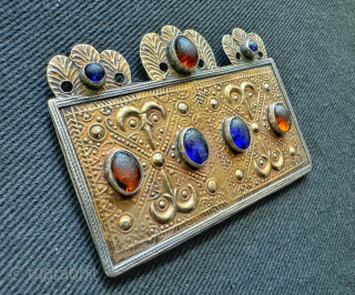 An outstanding antique gold appliqué and silver Turkoman / Turkmen Yomut / Yomud tribe talismanic pendant bridal jewellery ornament known as Acar Bag. Dating to the late 19th century / early 1900’s,  ...