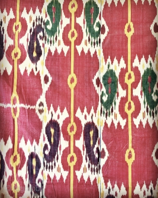 An Exceptional Antique 19th century Uzbek Adras Ikat hanging from Bokhara / Bukhara region. It is from the older period of Central Asian Ikat art with silk warped cotton weft and known  ...
