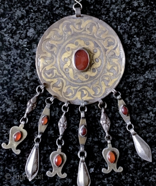 A very rare mid 19th century Tekke Turkoman / Turkmen Bridal Silver and Gold Jewelry known as Girda or Gulyakhan. They were worn as large elaborate pendant or brooch type of jewelry  ...