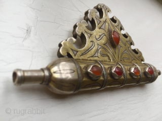 A highly collectible antique Turkoman / Turkmen silver pendant with gold gilding and carnelian (eye shaped) inset, dating to the 19th century. Attributed to the Tekke / Teke tribe of Central Asia,  ...