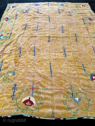 A very rare antique Uzbek or Tajik silk embroidered nim suzani on an atlas Ikat ground. Dating to third quarter of the 19th century Samarkand region. Suzani Ikat’s are some of the  ...