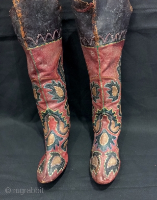 An exceptional antique Central Asian leather appliqué boots dating to the second half of the 19th century. This particular is relatively older than most one sees in the market and many of  ...