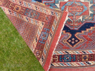 An interesting Afshar rug with three Turkmen guls. Worn but attractive. All good colours, late 19th Century. 5'6" x 4'4" / 168 x 130 cm.        