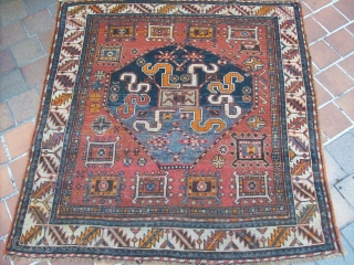 Chondzoresk rugs with this motive have been attributed to Kazak under the name of "Cloudband Kazak" the motive may derive from caucasian dragon carpet
it is probably the second most published karabagh motif.it  ...