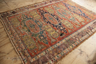 Richly coloured, with natural dyes, 19th century Caucasian Sumac rug. 193 x 268cm / 6'4" x 8'10"
Worn but no holes, sides reduced.           