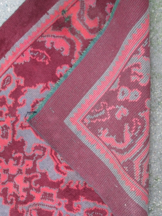 British rug, maroon ground with skeletal design in maroon, maroon-rose and grey; interesting 'neutral' colour palette which is very evocative of the rug's early 20th.century period, (slight 'fleecy' side-to-side band at far  ...