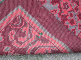 British rug, maroon ground with skeletal design in maroon, maroon-rose and grey; interesting 'neutral' colour palette which is very evocative of the rug's early 20th.century period, (slight 'fleecy' side-to-side band at far  ...