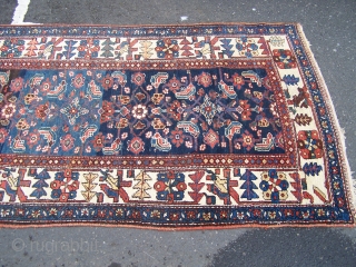 Kurdish runner, blue field displaying pleasing wool batch colour change arbrash effect decorated with the herati design, ivory framing main border, single woolen wefts, c1920s/1930s (80 years old approx) 395 x 107cm;  ...