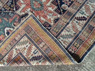 Shirvan rug, with column of four 'Lesghi' stars enclosed by ivory leaf-and-calyx border, cotton wefts, wool warps, very occasional synthetic orange (2 locations only approx -see detail image) in border, colours appear  ...