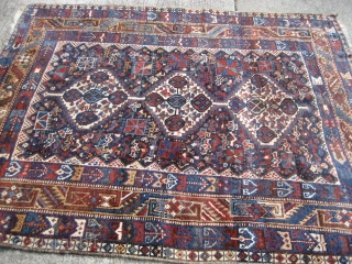 Kamseh rug 4' 11" x 6' 0" in full pile condition with nice color. Blanket-like handle. 

Possibly some other South Persian variety, but I'll stick with Shiraz to be on the conservative  ...