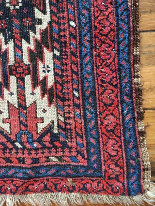 (probably) Baluch with asmalyk designs.  Third quarter 19th century.  Extremely good wools.  Unfortunately rug is badly worn, with a repaired hole and substantial wear.  However, the goat hair  ...